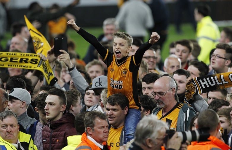 hull fans celebrate on the pitch after reaching the sky bet football league championship play off final photo reuters