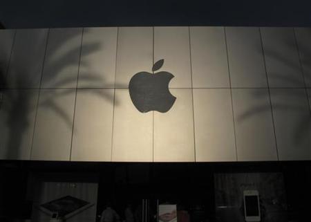 apple is also in separate talks to open its first official retail store photo reuters