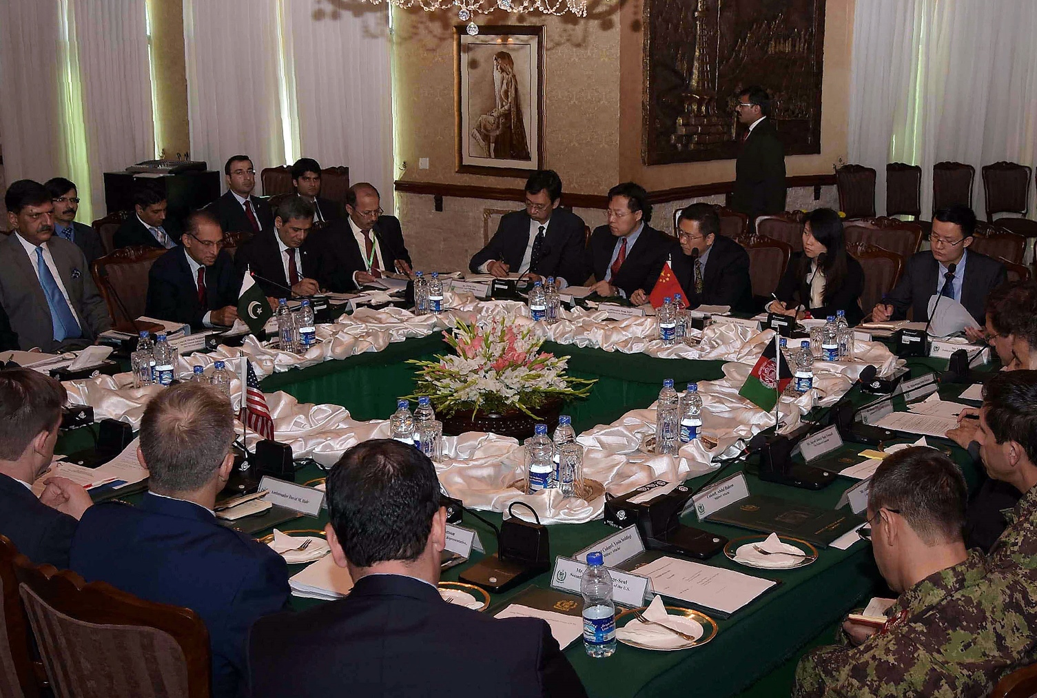 in this handout photograph released by the associated press of pakistan app on may 18 2016 foreign secretary aizaz ahmad chaudhry centre l chairs the fifth round of four way peace talks with afghanistan us and chinese delegates at the foreign ministry in islamabad photo afp