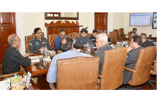 punjab police inspector general mushtaq ahmed sukhera chairing the regional police officers rpos conference photo express