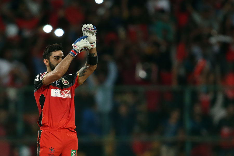 virat kohli points to his injured left hand after getting to his century in bangalore india on may 18 2016 photo courtesy bcci