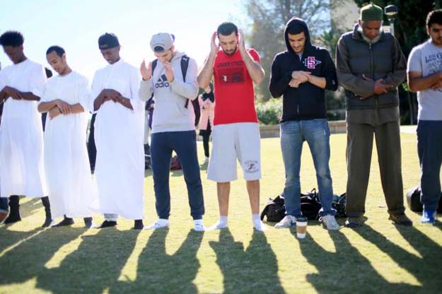 muslim students pray before at a rally against islamophobia at san diego state university in san diego california november 23 2015 photo reuters