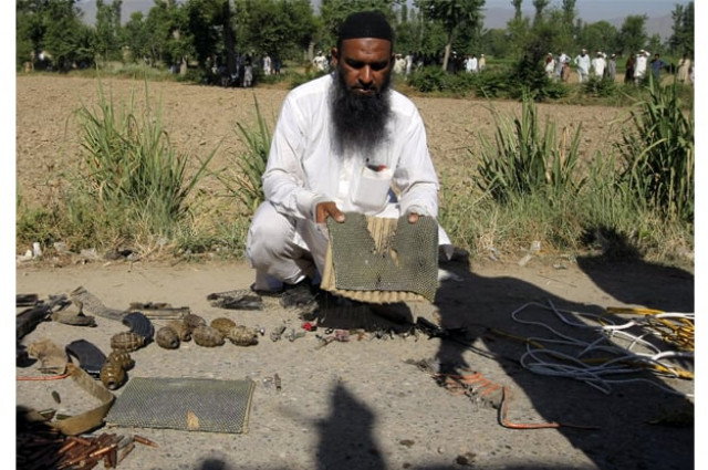 bomb disposal squad shows the suicide vests photo inp