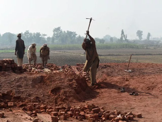 has promulgated 15 laws is revamping worker welfare schemes photo afp has promulgated 15 laws is revamping worker welfare schemes photo afp
