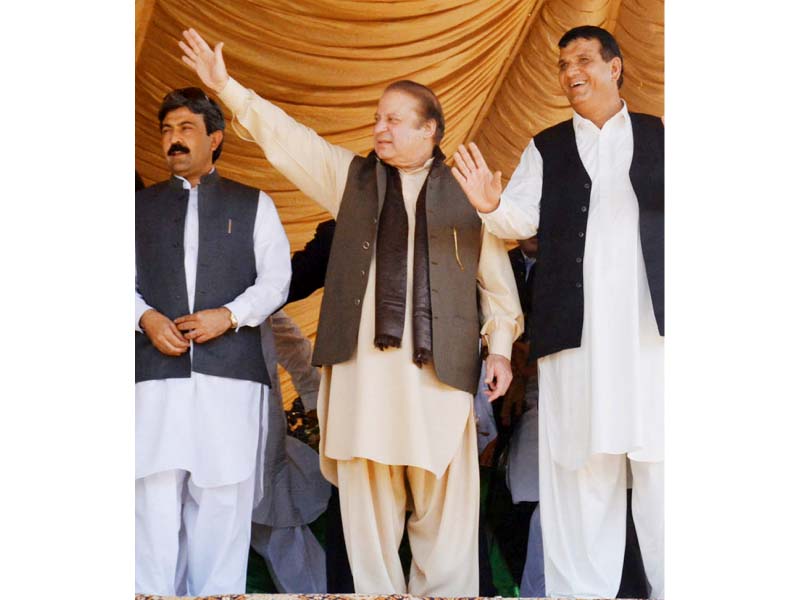 nawaz sharif waves to the crowd at a rally in mingora photo online