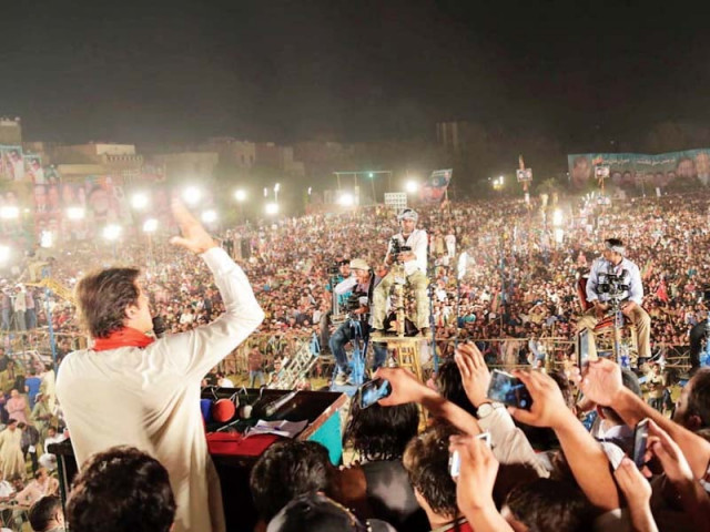 imran khan speaks at a gathering in faisalabad photo online imran khan speaks at a gathering in faisalabad photo online