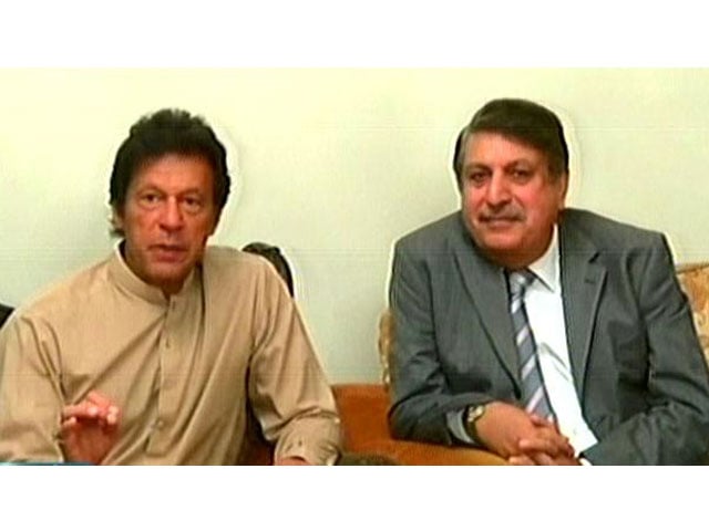 express news screen grab of pti chairman imran khan addressing a news conference while former k p governor iftikhar hussain sits next to him in islamabad on may 21 2016