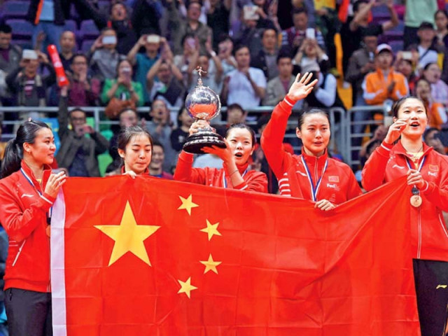 chinese players celebrate with the trophy after defeating south korea 3 1 in the final photo afp chinese players celebrate with the trophy after defeating south korea 3 1 in the final photo afp