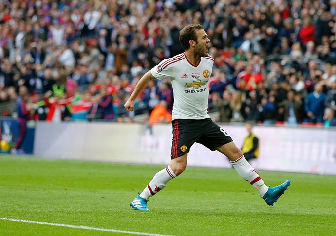 manchester united 039 s spanish midfielder juan mata celebrates after scoring their first goal during the english fa cup final football match between crystal palace and manchester united at wembley stadium in london on may 21 2016 photo afp