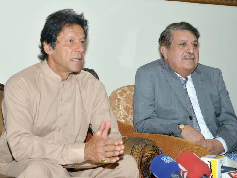 pti chief imran khan and iftikha hussain talk to the media in islamabad photo express