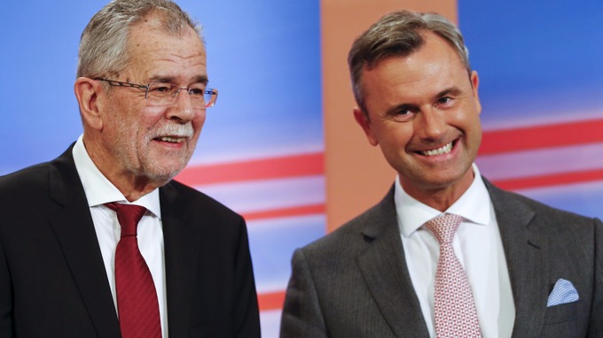 alexander van der bellen from the greens l and his rival norbert hofer r photo reuters