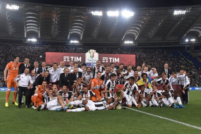 juventus 039 players pose with the trophy after winning the italian tim cup final football match ac milan vs juventus on may 21 2016 at the olympic stadium in rome juventus won 0 1 in the extra time photo afp juventus 039 players pose with the trophy after winning the italian tim cup final football match ac milan vs juventus on may 21 2016 at the olympic stadium in rome juventus won 0 1 in the extra time photo afp