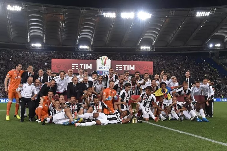 juventus 039 players pose with the trophy after winning the italian tim cup final football match ac milan vs juventus on may 21 2016 at the olympic stadium in rome juventus won 0 1 in the extra time photo afp juventus 039 players pose with the trophy after winning the italian tim cup final football match ac milan vs juventus on may 21 2016 at the olympic stadium in rome juventus won 0 1 in the extra time photo afp