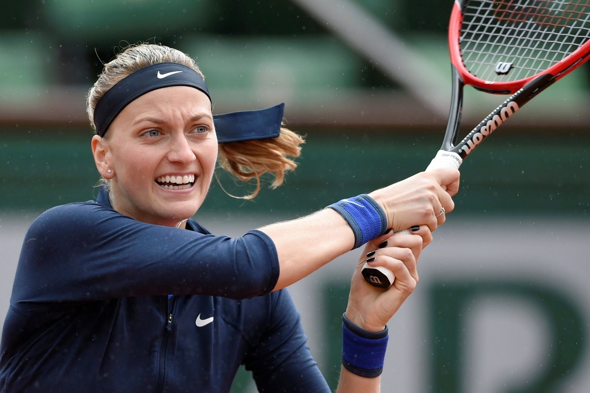 czech republic 039 s petra kvitova hits a backhand to montenegro 039 s danka kovinic during their first round match at the roland garros 2016 french tennis open in paris on may 22 2016 photo afp