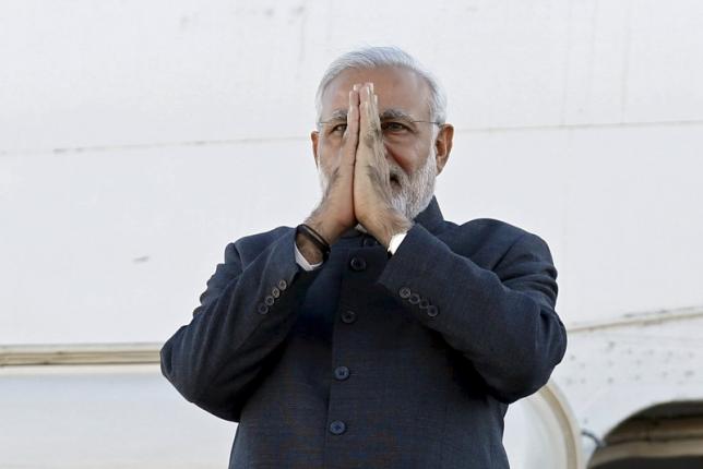 file photo of india 039 s prime minister narendra modi gesturing while disembarking from his plane after arriving at ottawa international airport canada photo reuters