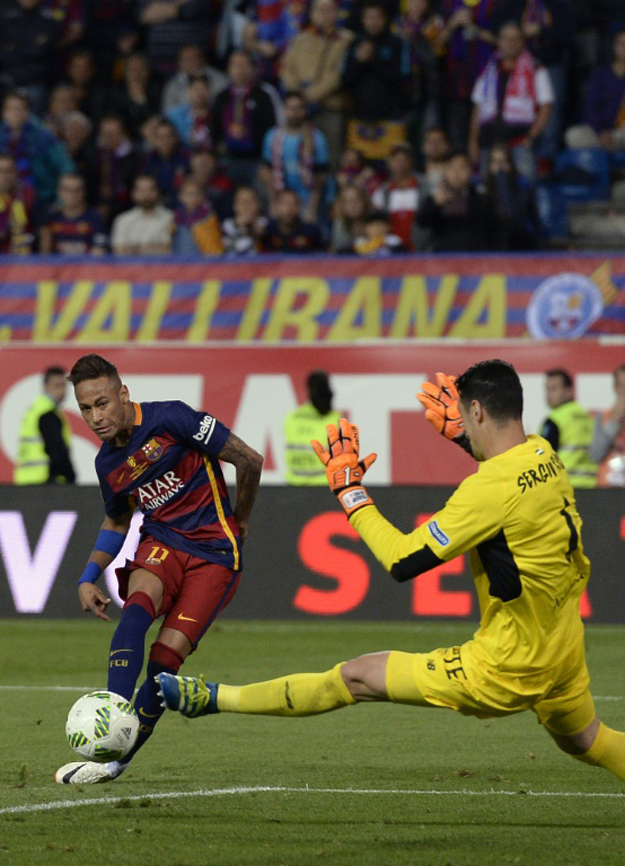 barcelona s forward neymar l scores past sevilla s goalkeeper sergio rico gonzalez on may 22 2016 photo afp