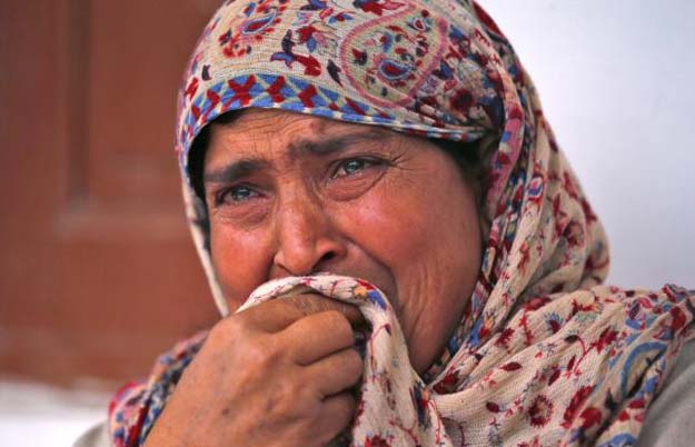 rafiqa mother of shaista hameed who was killed by a stray bullet during an encounter cries during an interview with reuters in lalhar south of srinagar may 16 2016 photo reuters