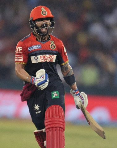 royal challengers bangalore captain virat kohli celebrate after wiiing the match against delhi daredevils during the 2016 indian premier league ipl twenty20 cricket match between delhi daredevils and royal challengers bangalore at shaheed veer narayan singh international cricket stadium raipur on may 22 2016 photo afp royal challengers bangalore captain virat kohli celebrate after wiiing the match against delhi daredevils during the 2016 indian premier league ipl twenty20 cricket match between delhi daredevils and royal challengers bangalore at shaheed veer narayan singh international cricket stadium raipur on may 22 2016 photo afp