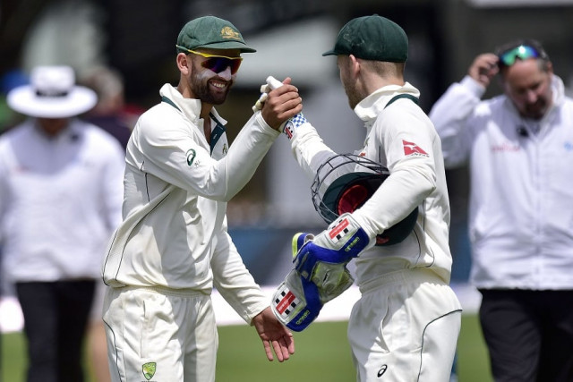 australia 039 s peter nevill centre r with teammate nathan lyon celebrate their win on day four of the first cricket test match between new zealand and australia at the basin reserve in wellington on february 15 2016 photo afp australia 039 s peter nevill centre r with teammate nathan lyon celebrate their win on day four of the first cricket test match between new zealand and australia at the basin reserve in wellington on february 15 2016 photo afp