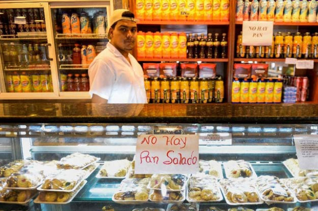 a sign reading quot no bread quot is displayed at a bakery in caracas on february 25 2016 as record shortages of basic goods runaway inflation and an escalating economic crisis cripple businesses photo afp a sign reading quot no bread quot is displayed at a bakery in caracas on february 25 2016 as record shortages of basic goods runaway inflation and an escalating economic crisis cripple businesses photo afp