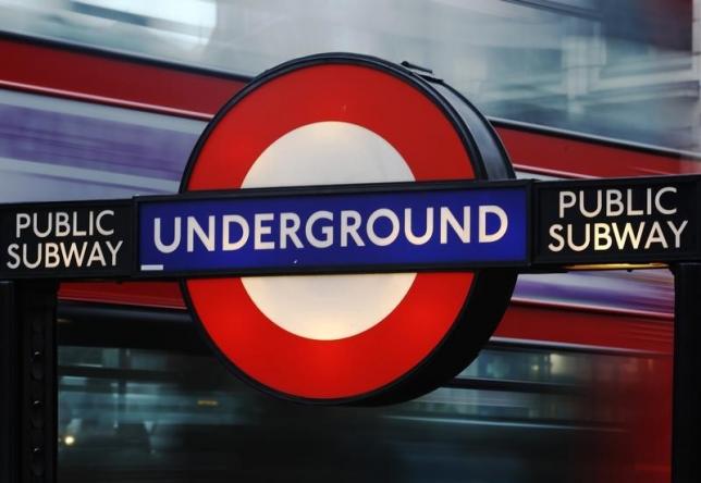 a bus passes a sign for the london underground tube system in london january 29 2013 photo reuters