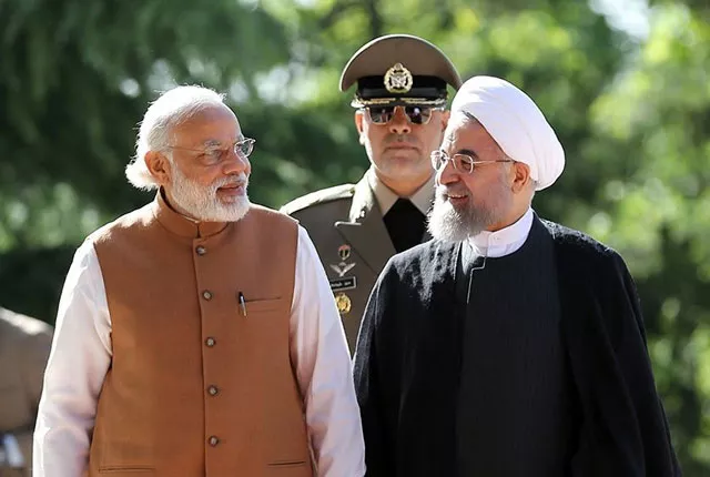 iranian president hassan rouhani on may 23 2016 shows him right walks alongside indian prime minister narendra modi during a welcome ceremony in tehran on may 23 2016 photo afp iranian president hassan rouhani on may 23 2016 shows him right walks alongside indian prime minister narendra modi during a welcome ceremony in tehran on may 23 2016 photo afp