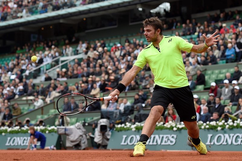 stanislas wawrinka returns the ball to lukas rosol during the first round match at roland garros in paris on may 23 2016 photo afp