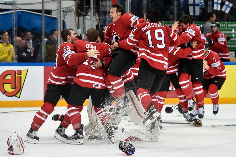 canada 039 s players celebrate on the rink after winning gold medal against finland at 2016 iihf ice hockey world championship in moscow on may 22 2016 photo afp
