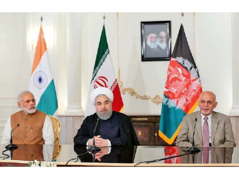 leaders of iran india and afghanistan at the signing of a transit trade agreement on chabahar port photo courtesy radio pakistan