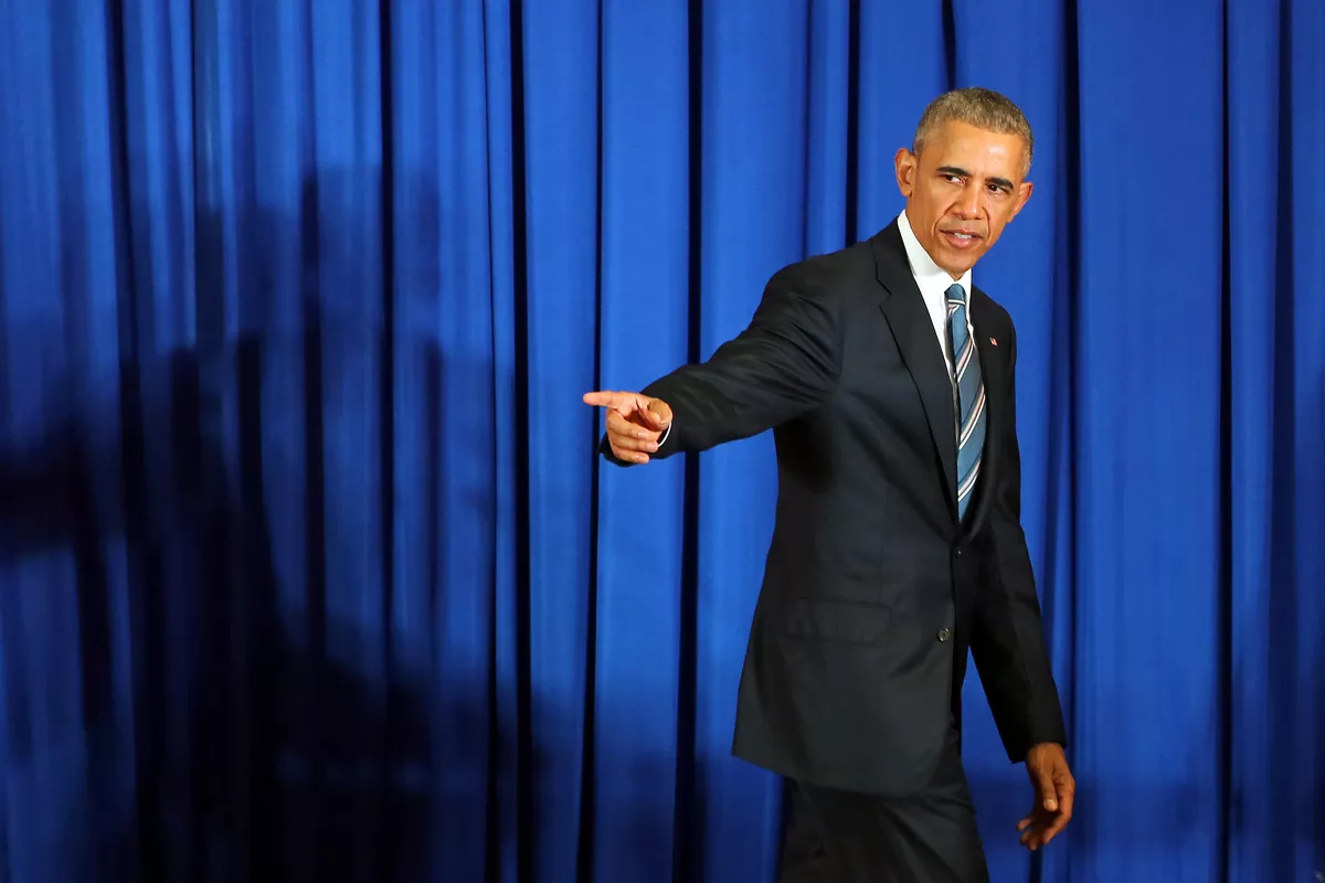 us president barack obama leaves the stage after a joint press conference with his vietnamese counterpart at the international convention center in hanoi on may 23 2016 photo afp us president barack obama leaves the stage after a joint press conference with his vietnamese counterpart at the international convention center in hanoi on may 23 2016 photo afp