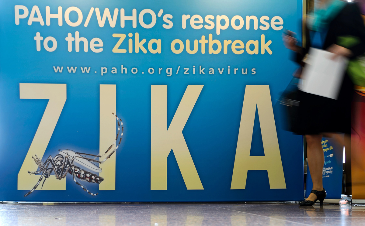 a banner on zika virus outbreak is pictured on the opening of the world health assembly with some 3 000 delegates from its 194 member states on may 23 2016 in geneva the spiralling crisis surrounding the zika virus is the result of decades of policy failures on mosquito control and poor access to family planning services the world health organization said monday afp photo