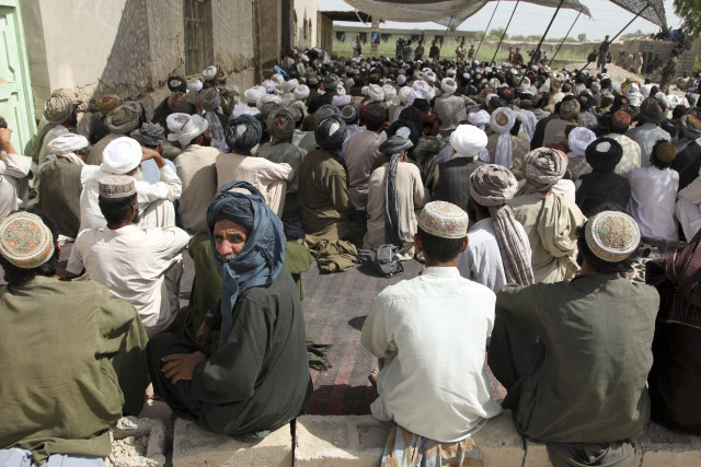 local afghan men attend a shura in the nawa district helmand province afghanistan on july 23 2009 photo usmc local afghan men attend a shura in the nawa district helmand province afghanistan on july 23 2009 photo usmc