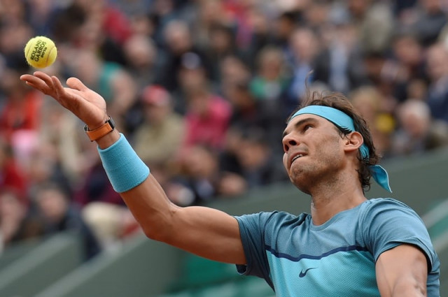 rafael nadal serves the ball to samuel groth at roland garros 2016 french tennis open in paris on may 24 2016 photo afp rafael nadal serves the ball to samuel groth at roland garros 2016 french tennis open in paris on may 24 2016 photo afp
