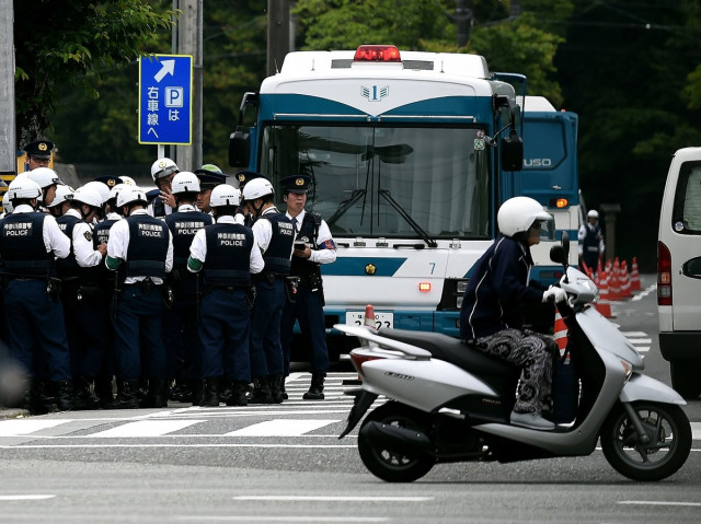 japanese police stand guard at a road intersection leading to the inner shrine of the ise grand shrine in ise shima 300 kilometres southwest of tokyo on may 25 2016 ahead of the 2016 ise shima g7 summit the annual event which takes place on may 26 27 draws leaders from some of the world 039 s richest nations including us president barack obama and german chancellor angela merkel afp photo japanese police stand guard at a road intersection leading to the inner shrine of the ise grand shrine in ise shima 300 kilometres southwest of tokyo on may 25 2016 ahead of the 2016 ise shima g7 summit the annual event which takes place on may 26 27 draws leaders from some of the world 039 s richest nations including us president barack obama and german chancellor angela merkel afp photo