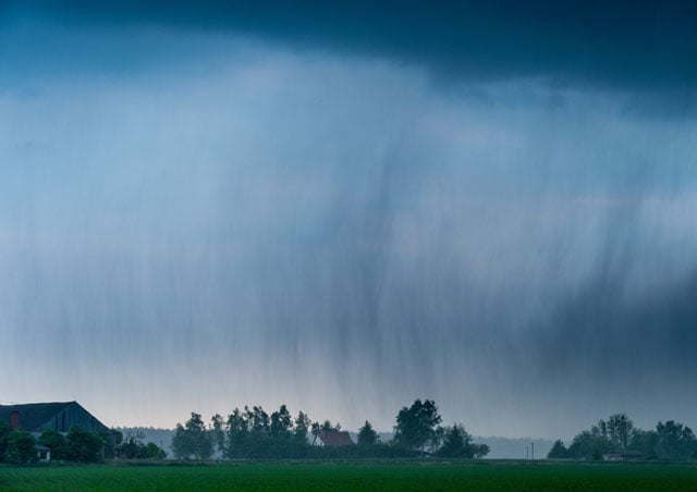 a thunder cell bringing heavy rain and hail hangs over a field near neuhardenberg northeastern germany on may 24 2016 photo afp