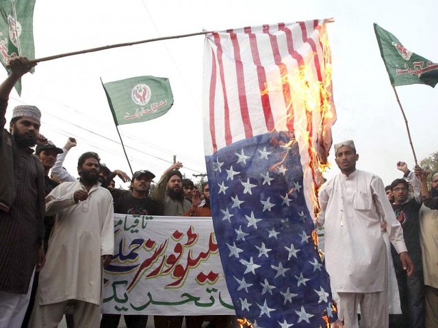 in this file photo protesters burn us flag photo inp