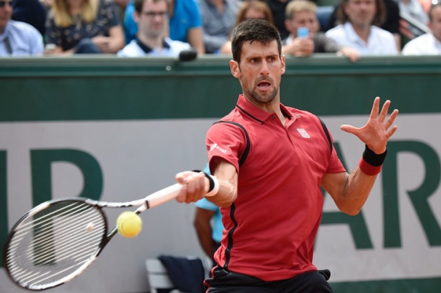 serbia 039 s novak djokovic returns the ball to belgium 039 s steve darcis during their men 039 s second round match at the roland garros 2016 french tennis open in paris on may 26 2016 photo afp