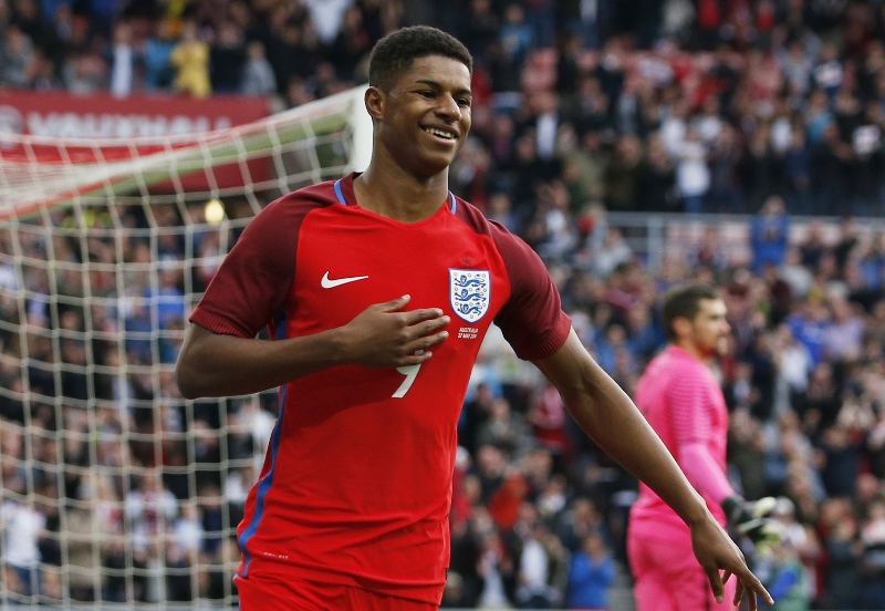 marcus rashford celebrates after scoring the first goal for england photo reuters