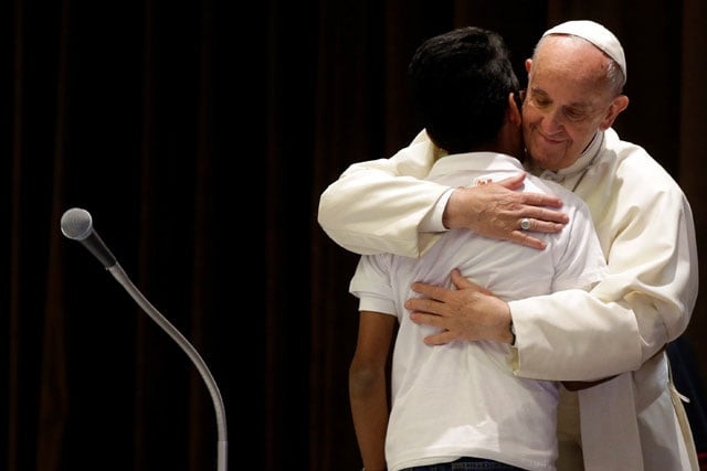 pope francis hugs a boy as he meets with youths at the vatican may 28 2016 photo reuters pope francis hugs a boy as he meets with youths at the vatican may 28 2016 photo reuters