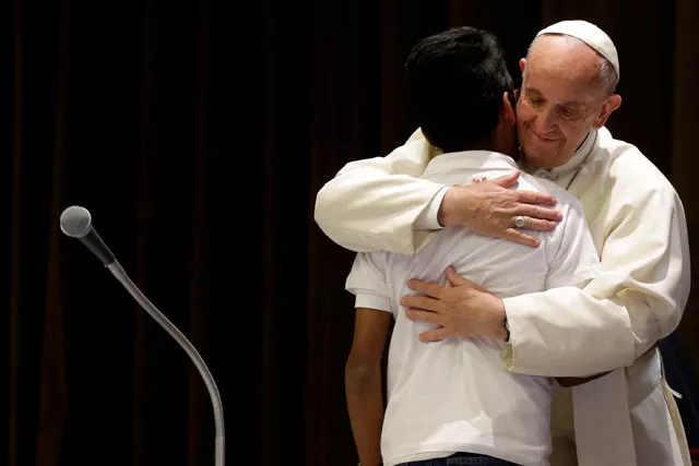 pope francis hugs a boy as he meets with youths at the vatican may 28 2016 photo reuters pope francis hugs a boy as he meets with youths at the vatican may 28 2016 photo reuters