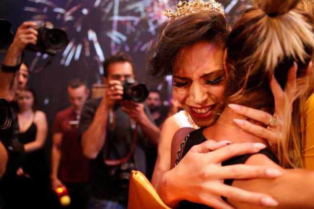 israel 039 s first transgender beauty pageant won by a christian arab on friday brought together contestants from the holy land 039 s main faiths in an unconventional show of tolerance and coexistence photo reuters