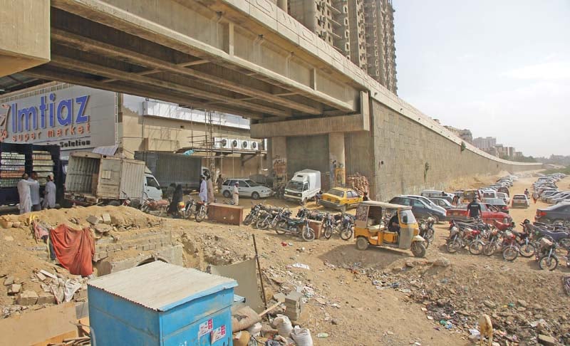 customers are told to park by the lyari river as the superstore offers no parking facility photo athar khan express