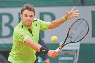 french open wawrinka keeps cool to book last eight berth