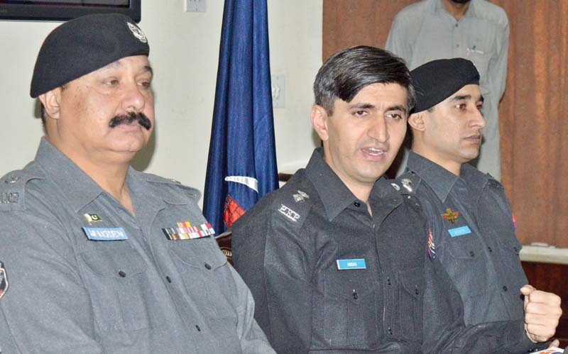 ssp operations abbas majeed khan marwat addresses a press conference in police lines photo express