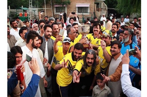 members of kpk assembly celebrating their victory photo online