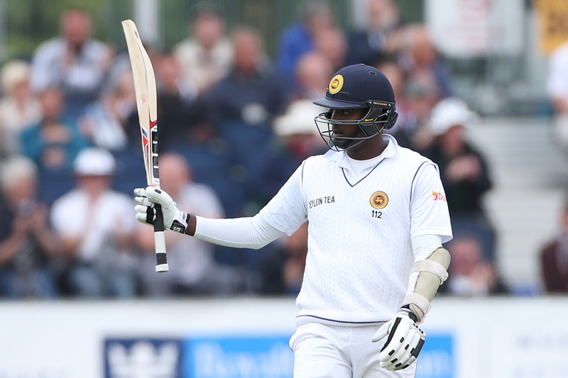 angelo matthews celebrates after scoring 50 on the third day of the second test cricket match between england and sri lanka at the riverside in chester le street england on may 29 2016 photo afp