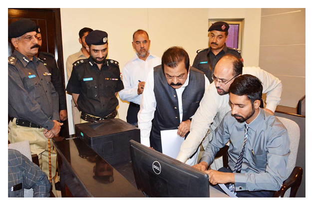 law minister rana sanaullah khan seen during his visit to computer lab at kotwali police station photo online