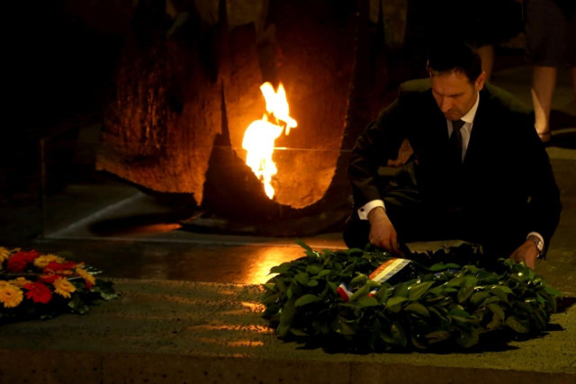 croatian foreign minister miro kovac lays a wreath at the hall of remembrance on may 30 2016 during his visit to the yad vashem holocaust memorial museum in jerusalem commemorating the six million jews killed by the nazis during world war ii afp photo