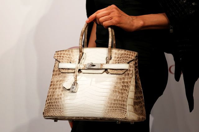 a model carries a hermes signature birkin with himalayan crocodile leather and diamonds sold for 300 168 at a christie 039 s auction on may 30 2016 which becomes the world 039 s most expensive handbag at a preview in hong kong china may 4 2016 photo reuters a model carries a hermes signature birkin with himalayan crocodile leather and diamonds sold for 300 168 at a christie 039 s auction on may 30 2016 which becomes the world 039 s most expensive handbag at a preview in hong kong china may 4 2016 photo reuters