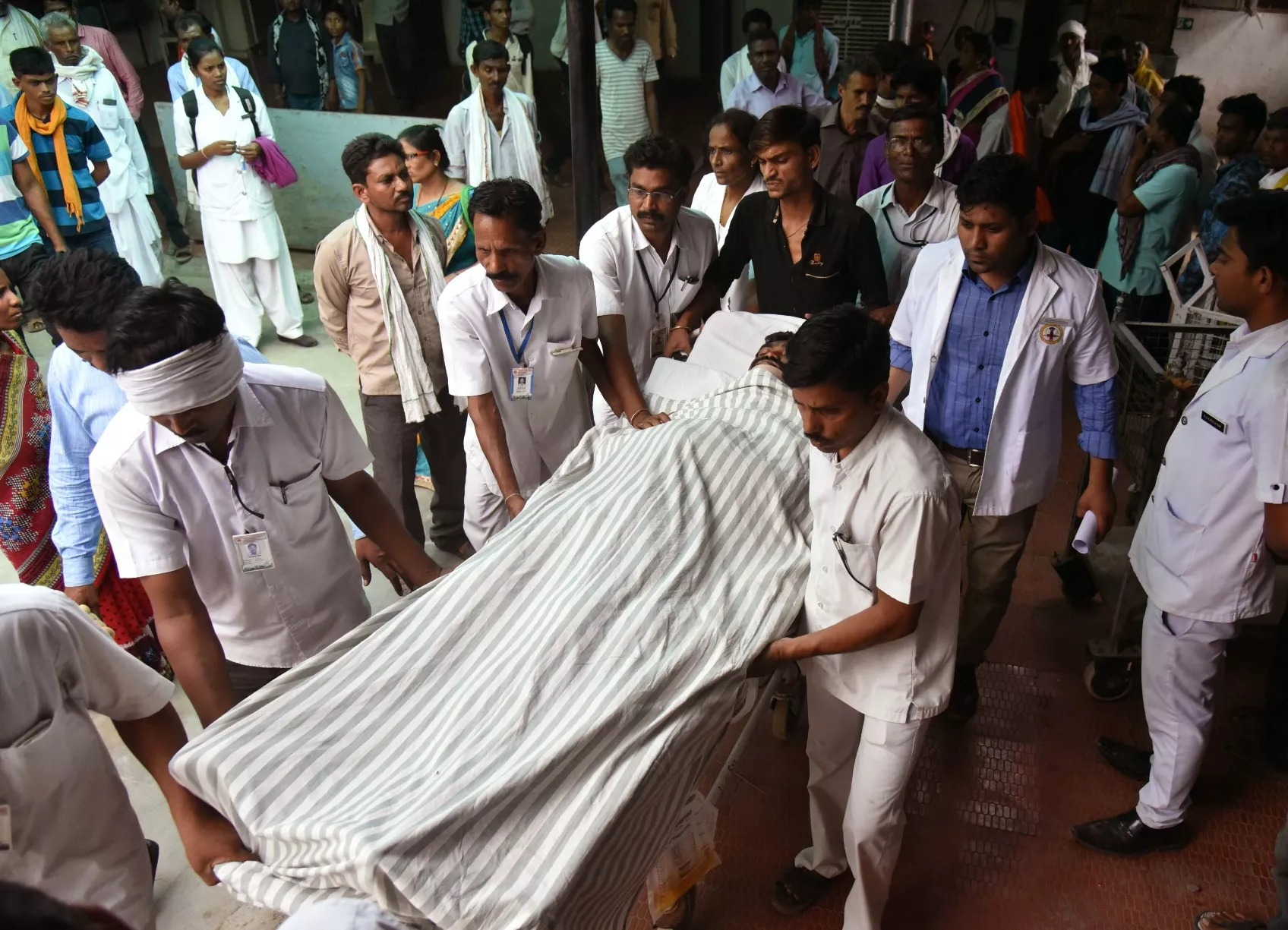 indian medical staff bring a man injured in a fire to hospital in wardha some 100kms from nagpur on may 31 2016 photo afp indian medical staff bring a man injured in a fire to hospital in wardha some 100kms from nagpur on may 31 2016 photo afp